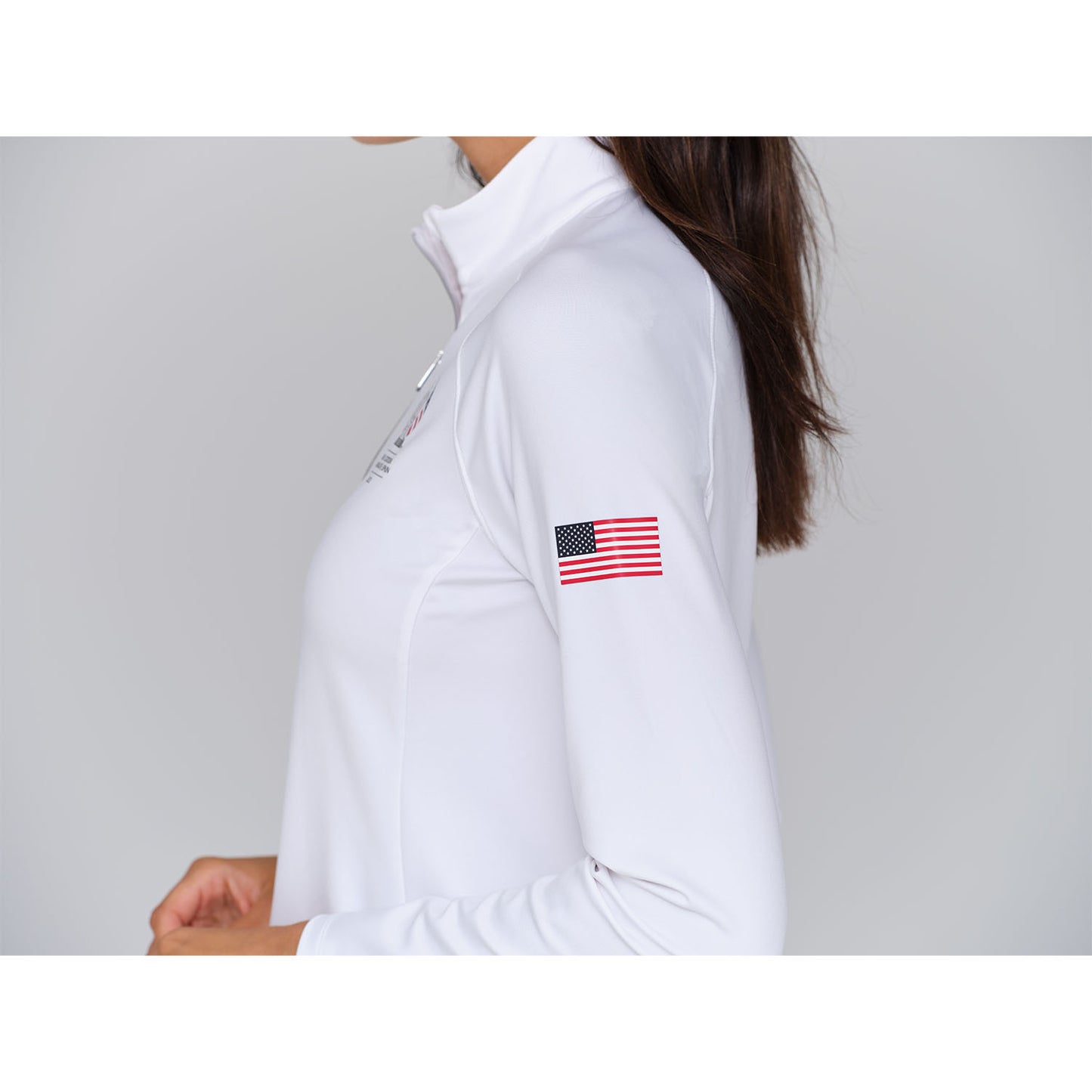 Dunning 2023 LPGA Official Solheim Cup Team Uniform Women's Player Jersey Performance Quarter Zip in White - Zoomed in Lifestyle Left Side View