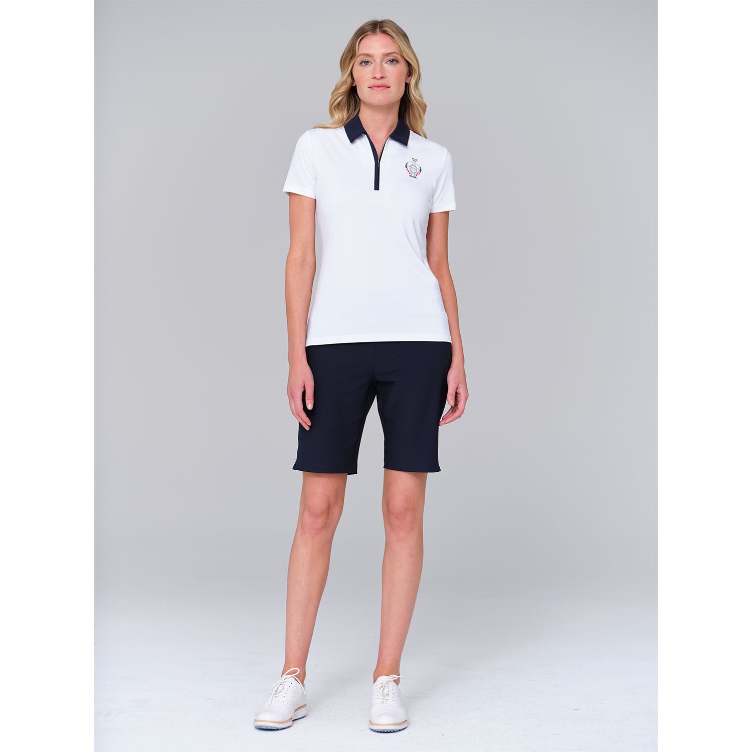 Dunning 2023 LPGA Official Solheim Cup Team Uniform Women's Short Sleeve Performance Polo in White - Lifestyle Front View