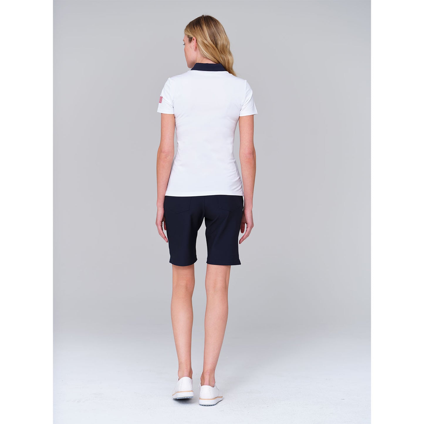 Dunning 2023 LPGA Official Solheim Cup Team Uniform Women's Short Sleeve Performance Polo in White - Lifestyle Back View