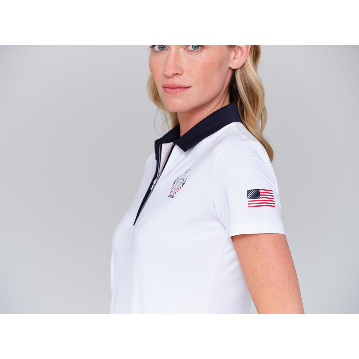 Dunning 2023 LPGA Official Solheim Cup Team Uniform Women's Short Sleeve Performance Polo in White - Lifestyle Zoomed in Angled Left Side View